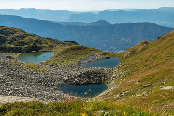 Lacs de Montartier en été en Savoie , vue sur les Bauges et le Mont Granier, Massif de la Lauzière, Alpes , France