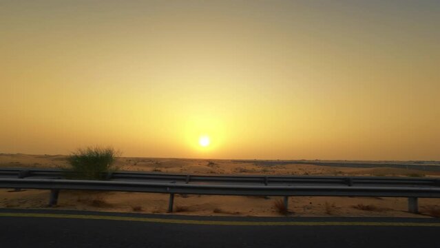 Travel In Dubai Highway At Sunset Into The Desert