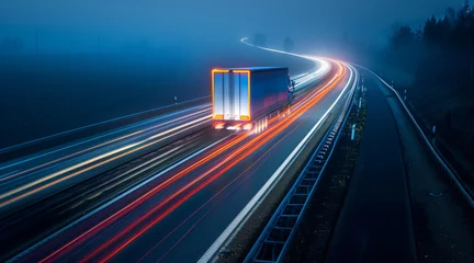Tuinposter Trucks on highway in night time. Motion blur, light trails. Transportation, logistic. Timelapse, hyperlapse of transportation. Abstract soft glowing lines © Enrique