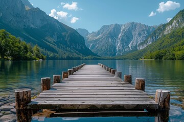 Obraz premium A breathtaking view of a serene lake with crystal-clear water embraced by towering mountains and a wooden pier