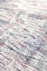 Fototapeta premium abstract art background of white scuffs on a purple background