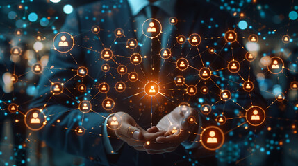 Business network concept. Management strategy. Human resources. business man in a modern office with floating graphic icons around is hand