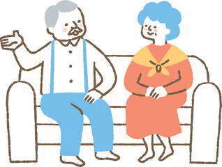 自宅のソファーに座って話をする高齢の男女_色