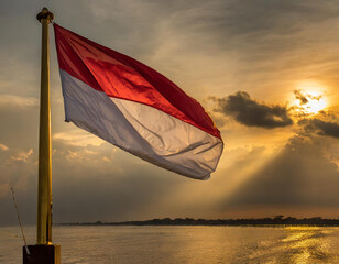 dramatic indonesia flag with sunset as background