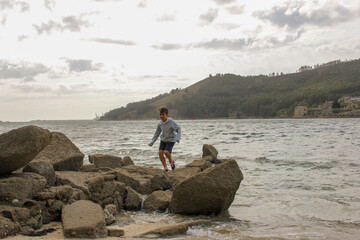 boy having a good time in a beach