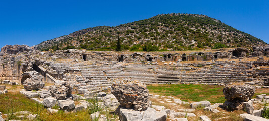 Fototapeta na wymiar Ancient amphitheater of Limyra located in Antalya Province. Lycian ancient civilization hearitage in modern Turkey.
