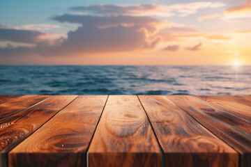 Wooden table top on the background of the sea and sunset