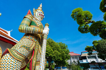 Statues of buddhist giants demon guardians at Gates to Ordination Hall Wat Arun. - 751922482