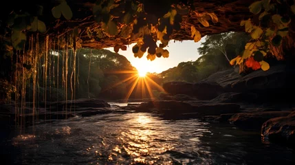 Tuinposter Sunset at Waterfall Caves in Tropical Landscapes, To showcase the breathtaking beauty of nature and the unique landscapes found in the exotic jungles © Sittichok