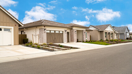 Row of homes with blue sky