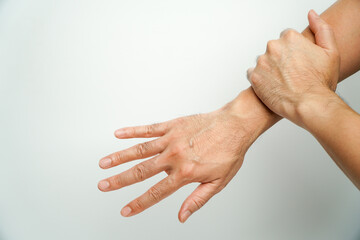 Man has severe arm pain in right arm on white background.,Pain in forearm, muscle inflammation,...