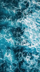 Fototapeta na wymiar abstract background of blue sea water with waves and foam, natural background