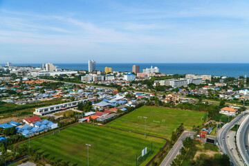 Fototapeta na wymiar View of the city of Hua Hin in Thailand and football fields from above