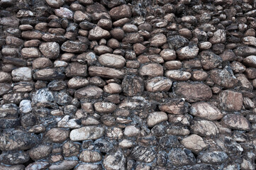 Old rough stone wall background