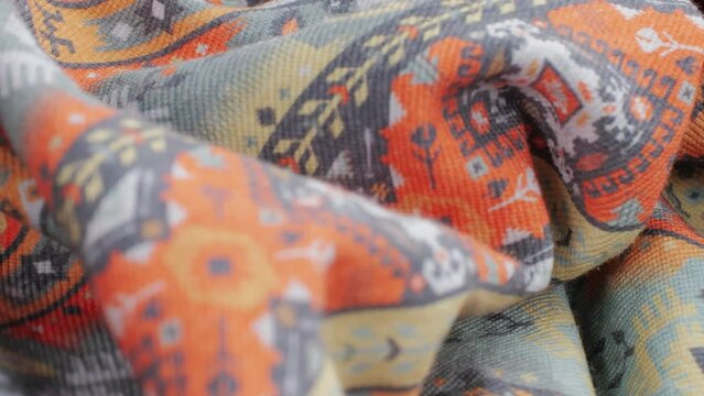 Colorful textile cloth texture close-up macro. Fashion fabric multicolor.