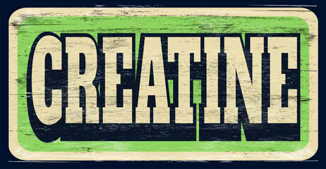 Aged and distressed creatine sign on wood