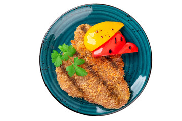 Golden fried breaded chicken schnitzel in a blue plate on a white background, chicken chop dishes,...