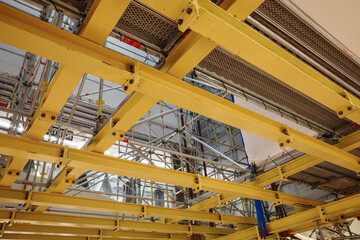 Industrial Ceiling with Metal Beams and Electrical Conduits