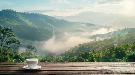 Empty wooden table with mountain view, thin fog and a cup of coffee in the morning.