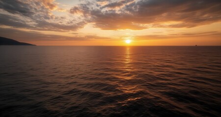 Fototapeta premium Sunset's golden glow on the horizon