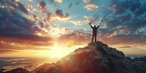 Silhouette of a man standing at the top of mountain with stretching arm up, success concept  - obrazy, fototapety, plakaty