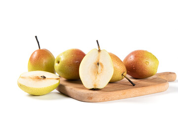 ripe pear fruit with half and slices isolated on white background
