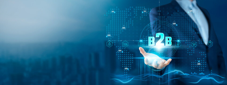 B2B: Businessman Holding B2B on Global Technology Network, Collaboration and Partnership, Business Growth, Market Expansion
