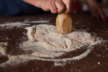 Photography of chicken milanesa preparation. Food preparation concept.