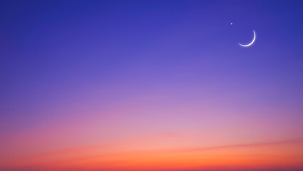 Crescent moon and star on colorful twilight sky, Beautiful evening horizon sky background with free...
