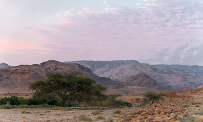 Beautiful sunset on way out the gorge Wadi Al Ghuwayr or An Nakhil and wadi Al Dathneh near Amman in Jordan