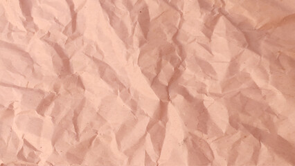 Craft crumpled paper, cardboard background. Brown kraft sheet texture, torn antique page, wallpaper or parchment abstract design,