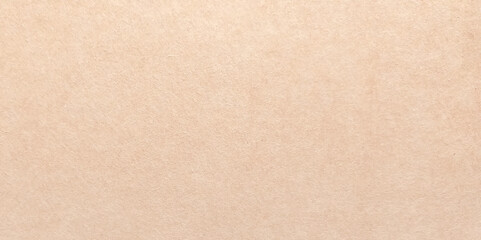 Fototapeta premium Abstract brown paper sheet, parchment or papyrus surface. Background of brown kraft paper or cardboard texture. vector realistic illustration