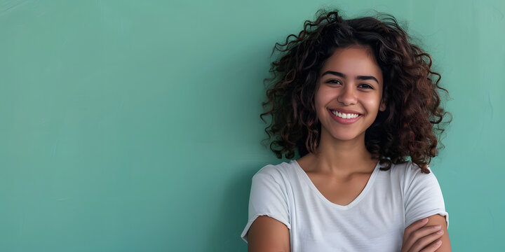 arms crossed and portrait of happy black young woman on green background for confident, fashion and elegant style, copy space