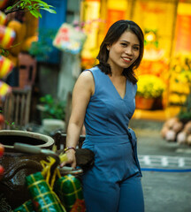 Woman wearing trendy clothes, well-proportioned figure of 35 years old, beautiful colors in Sai...