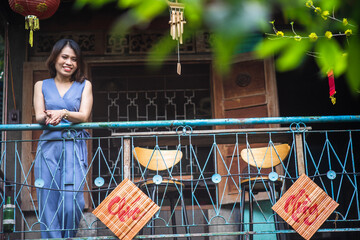 Woman wearing trendy clothes, well-proportioned figure of 35 years old, beautiful colors in Sai...