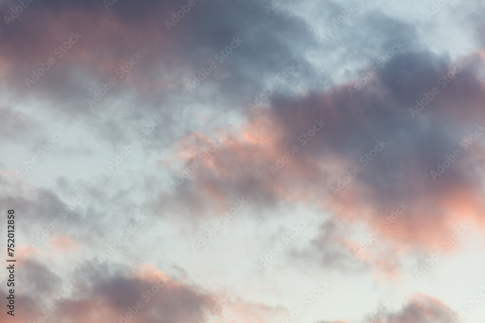 Poster beautiful clouds at sunset as a background