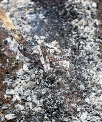 Burning coals in a fire as a background