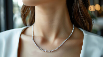 Close up of Diamond necklace on woman's neck at jewelry store. - obrazy, fototapety, plakaty