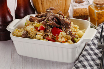 Traditional couscous with beef and vegetables