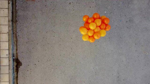 Aerial shot of Orange Ballons, Violence against women, November 6, Footage