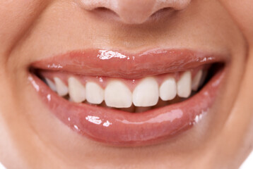 Closeup, lips and teeth whitening with woman for beauty, makeup with gloss for hydration and dental...