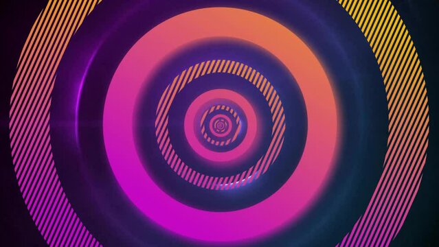 Animation of pink and orange concentric data loading rings processing over purple lights