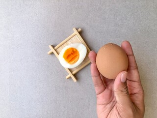Hand holding egg