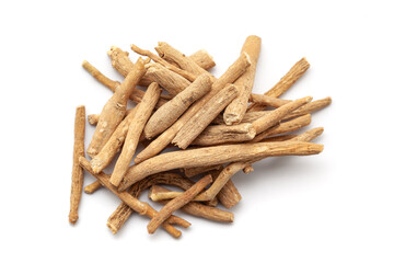 A pile of Dry Organic Ashwagandha (Withania somnifera) roots, isolated on a white background. Top...