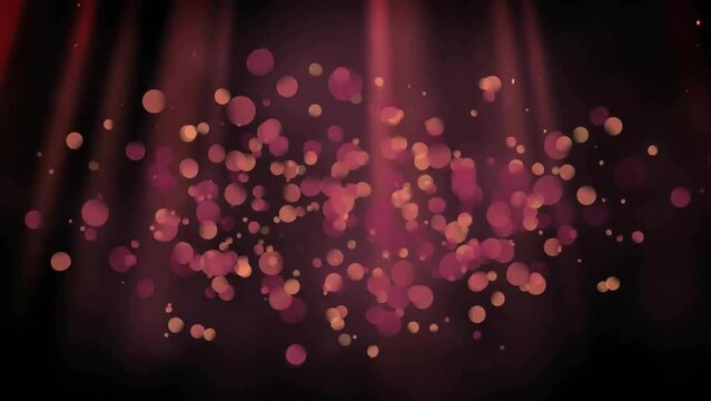 Animation of glowing light spots moving on seamless loop on black background