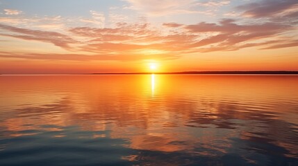 Fototapeta na wymiar Glorious sunrise over water, its beauty reflected in the tranquil surface, creating a breathtaking and serene scene of natural splendor. 