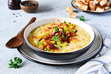 .Corn soup with vegetables and bacon