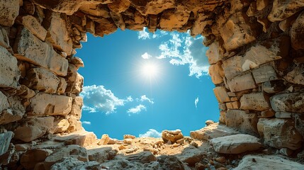 Ancient ruins under a clear sky, sun peeking through. old stones frame the blue above. historic feel in a tranquil setting. perfect for backgrounds. AI