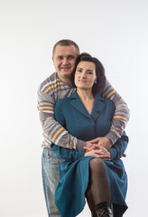 studio portrait of husband and wife happy family 1