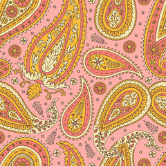 Colorful seamless pattern with yellow Paisley motifs on pink background. Traditional indian repeat design.
